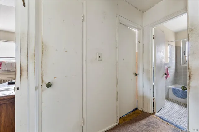 a bathroom with a glass door shower
