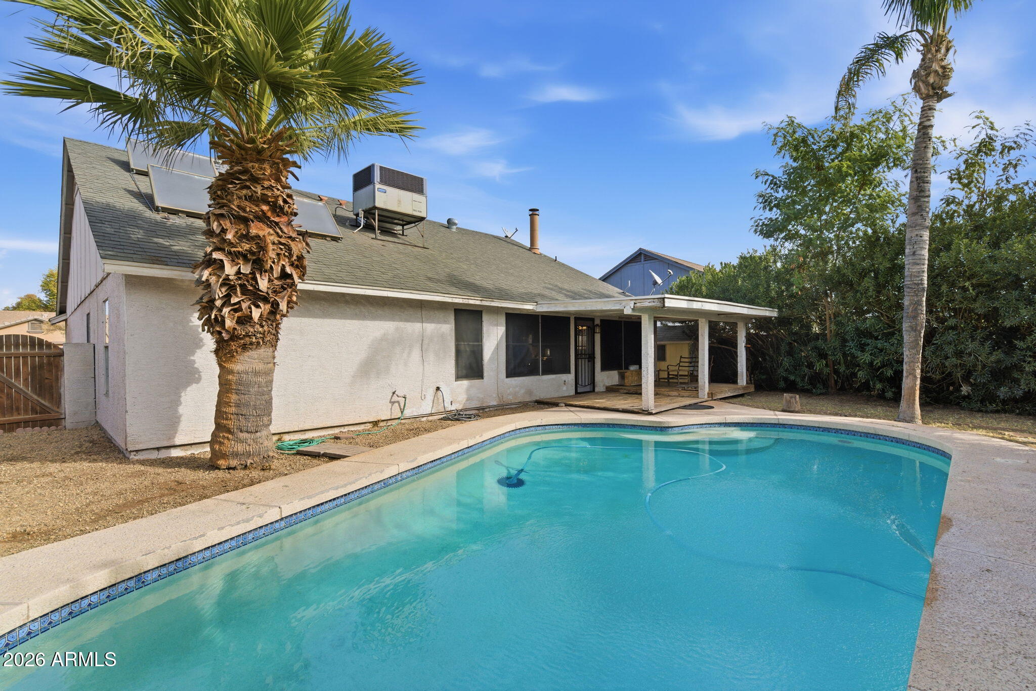7119 West Ocotillo Road Glendale, AZ 85303 - Photo 23 of 24 a front view of a house with garden