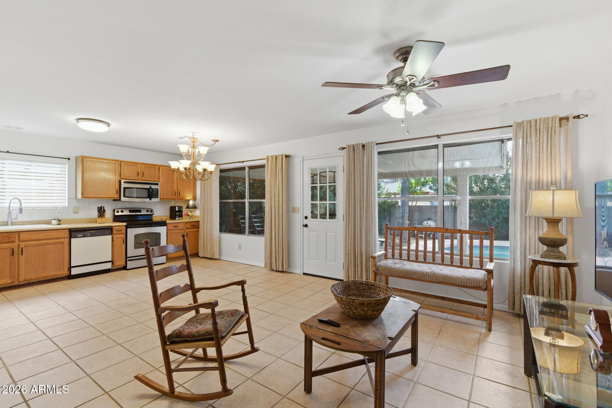 7119 West Ocotillo Road Glendale, AZ 85303 - Photo 6 of 24 a living room with furniture and kitchen view