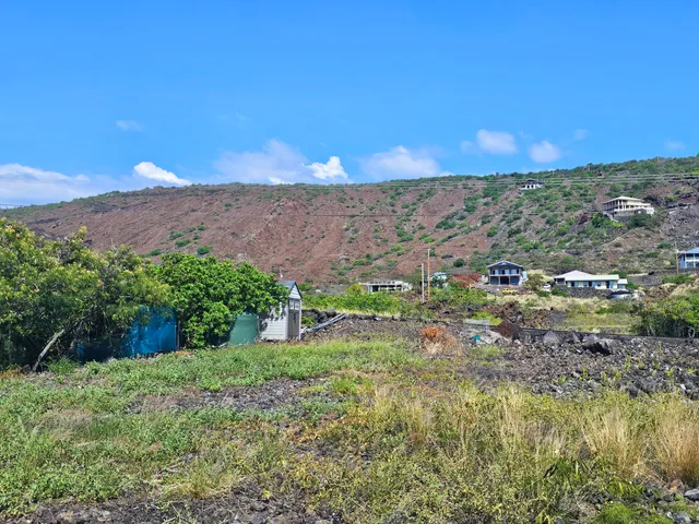a view of a yard with an outdoor space and seating