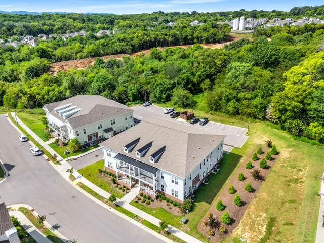 an aerial view of a house with a garden
