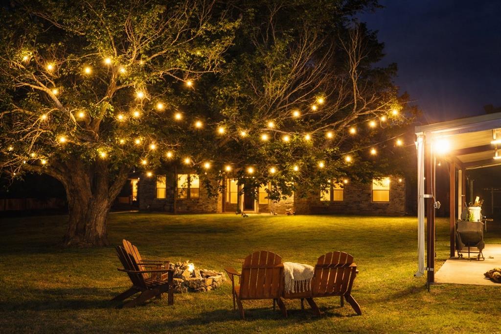 100 Knob Road Springtown, TX 76082 - Photo 2 of 29 a view of a lake from a yard