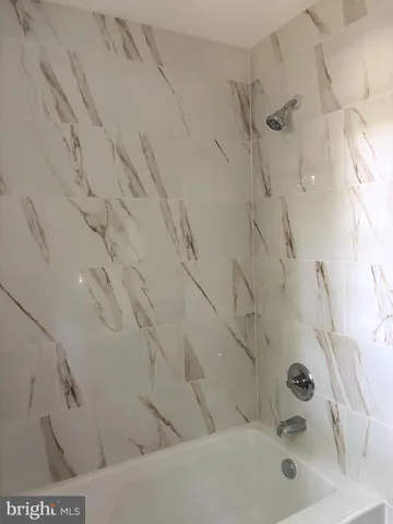 a bathroom with a bathtub