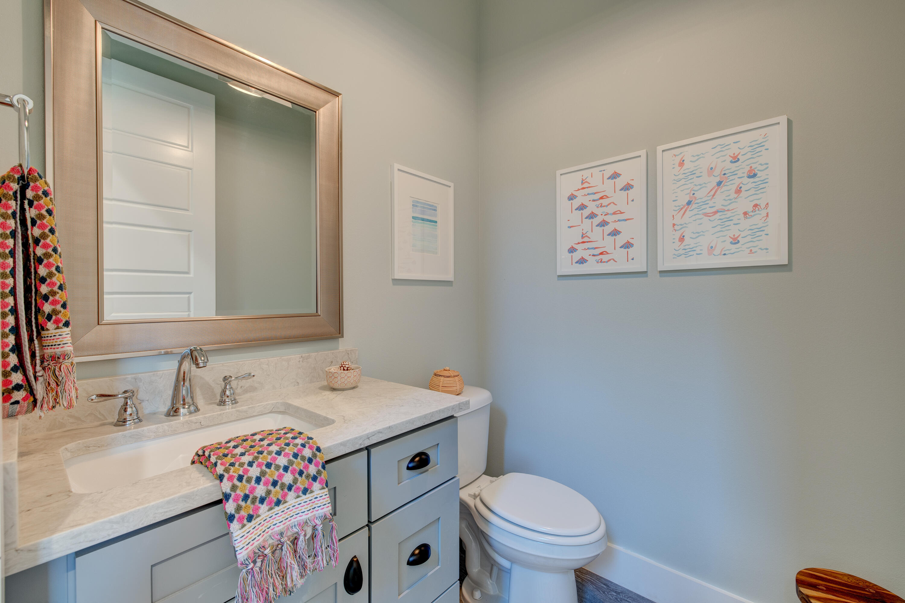 34 Gulfview Way Santa Rosa Beach, FL 32459 - Photo 18 of 54 a bathroom with a granite countertop toilet sink and mirror