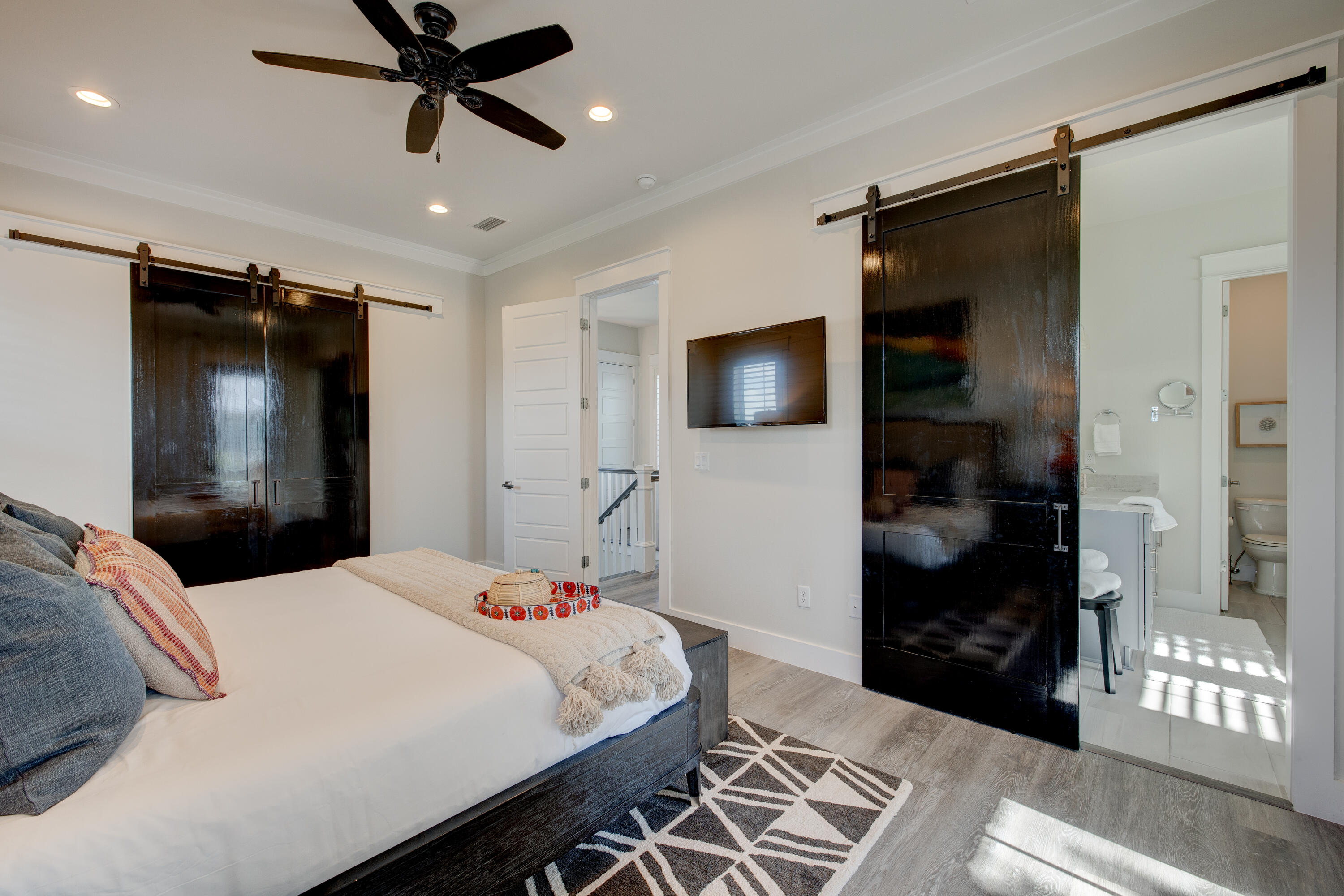 34 Gulfview Way Santa Rosa Beach, FL 32459 - Photo 22 of 54 a bedroom with a bed and a flat tv screen