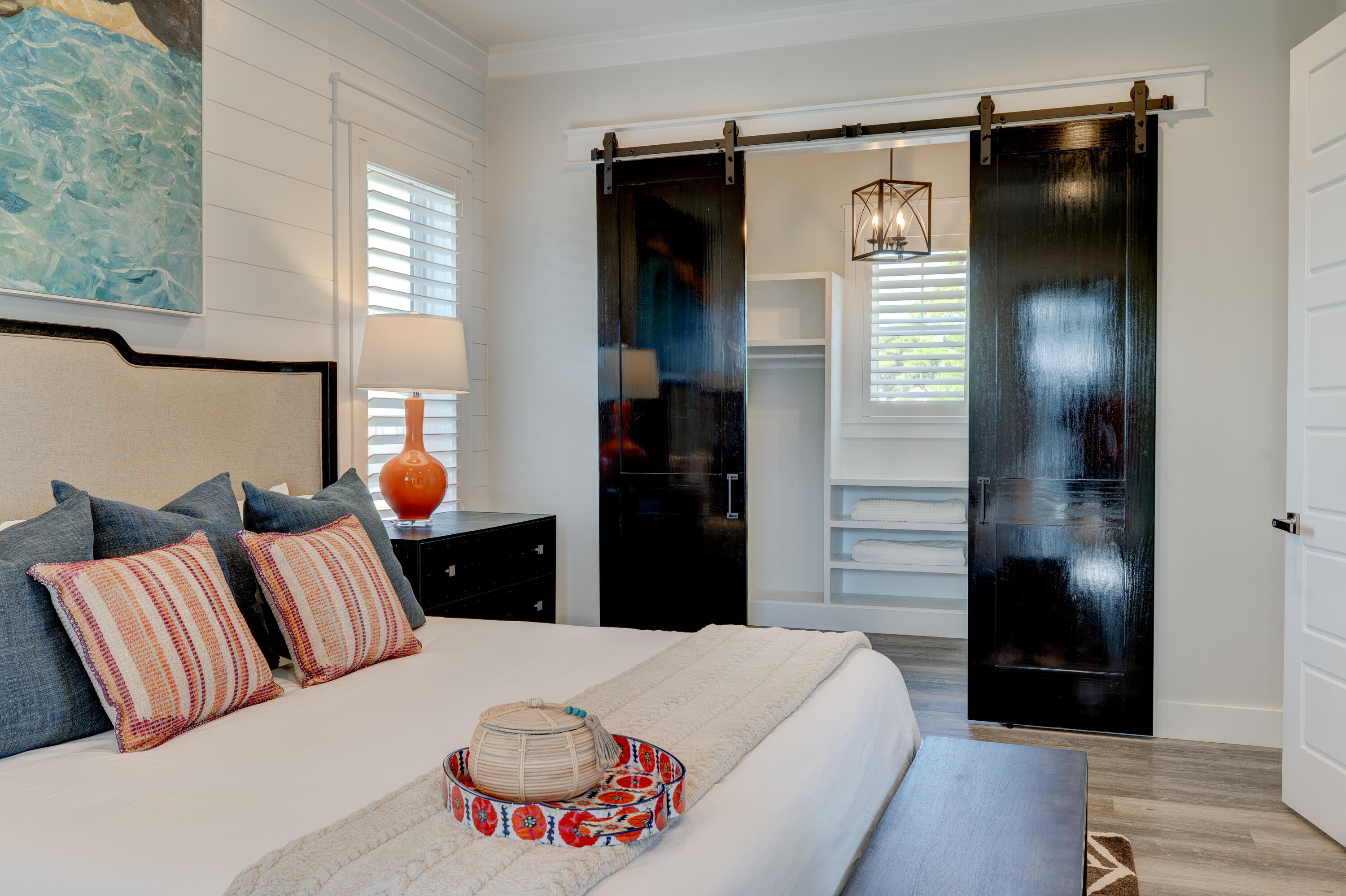 34 Gulfview Way Santa Rosa Beach, FL 32459 - Photo 23 of 54 a bedroom with a bed and a chandelier