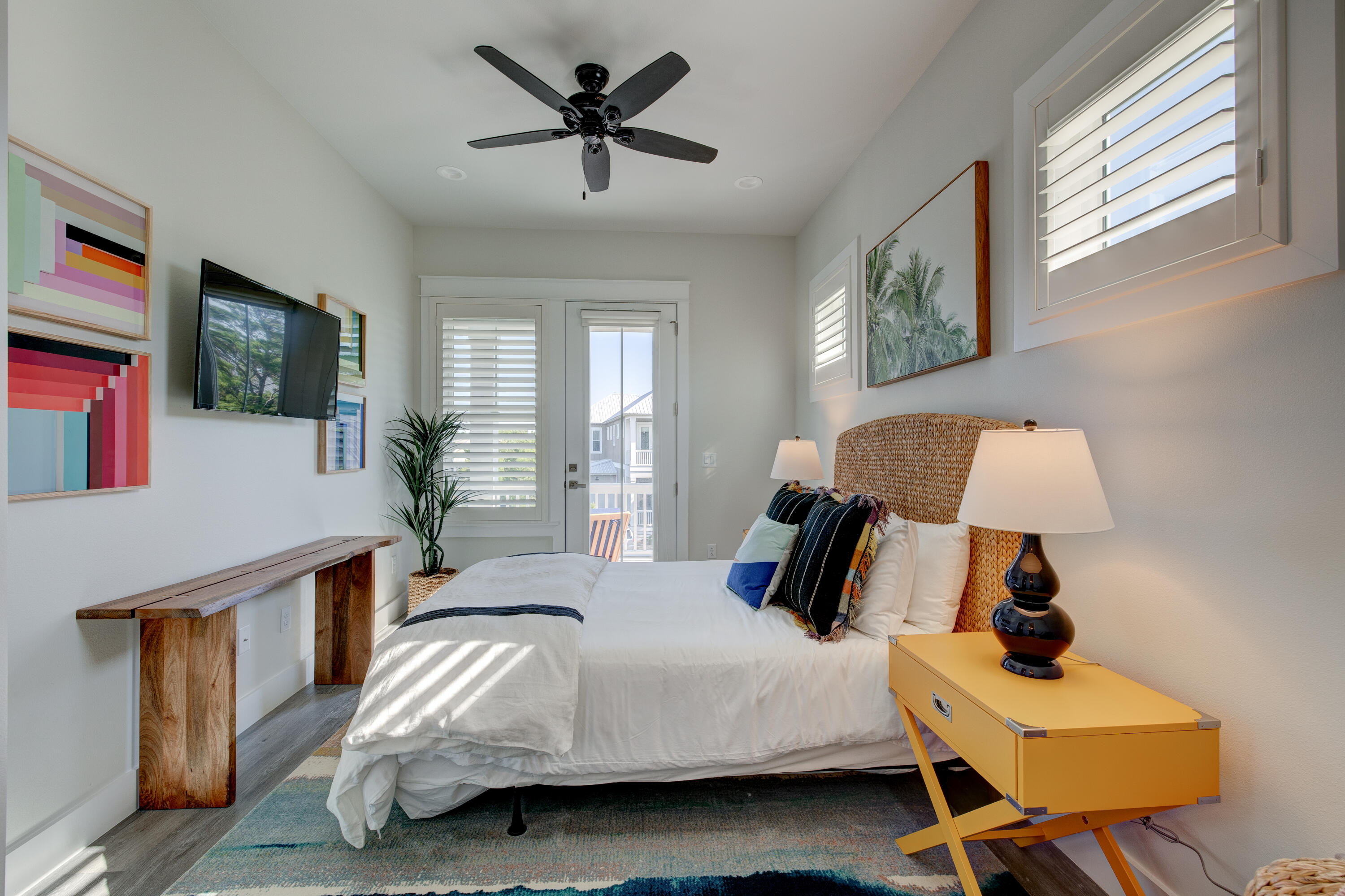 34 Gulfview Way Santa Rosa Beach, FL 32459 - Photo 41 of 54 a bedroom with a bed a flat screen tv and dresser next to a window
