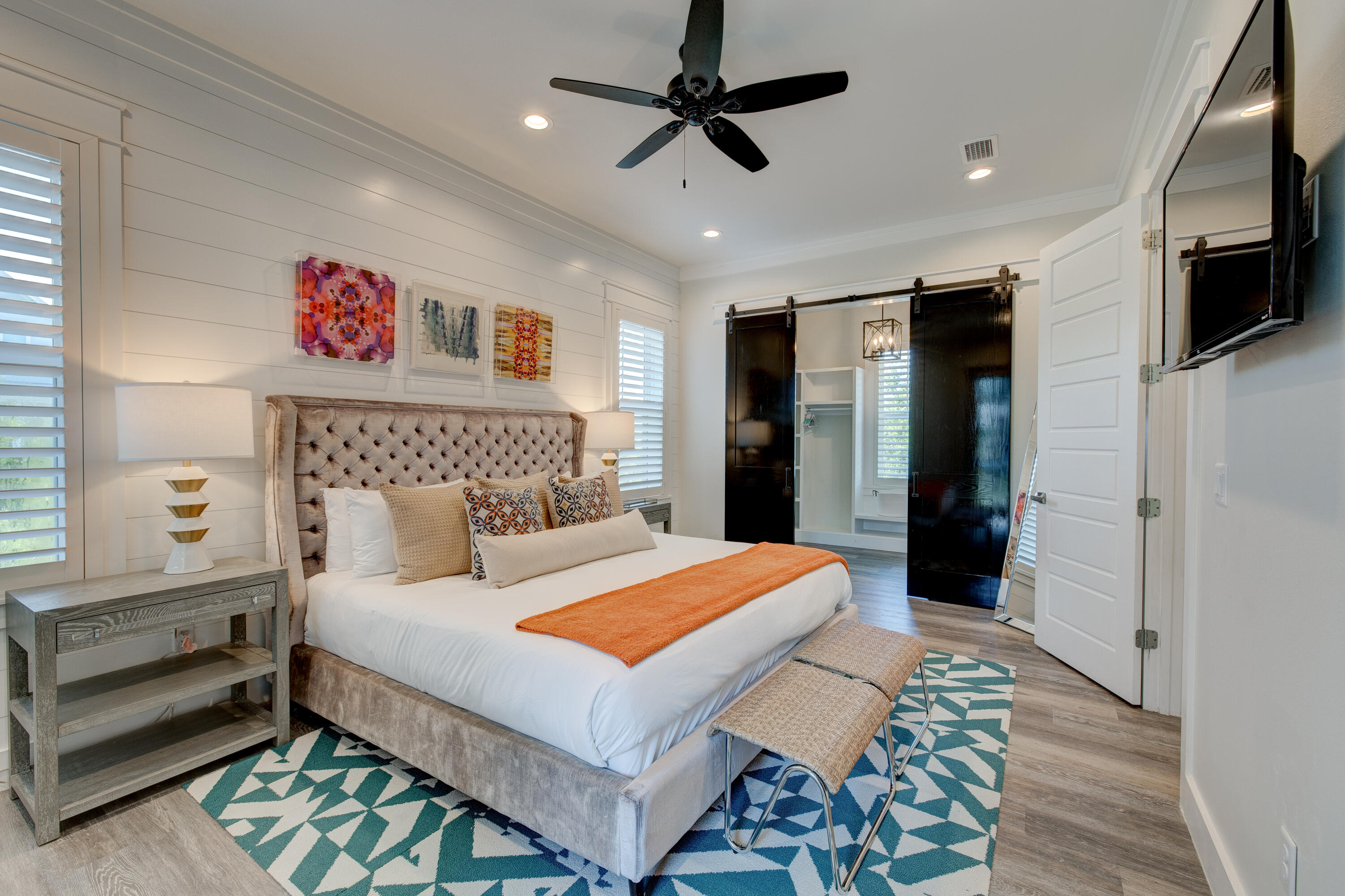 34 Gulfview Way Santa Rosa Beach, FL 32459 - Photo 45 of 54 a bedroom with a bed a dresser and flat screen tv