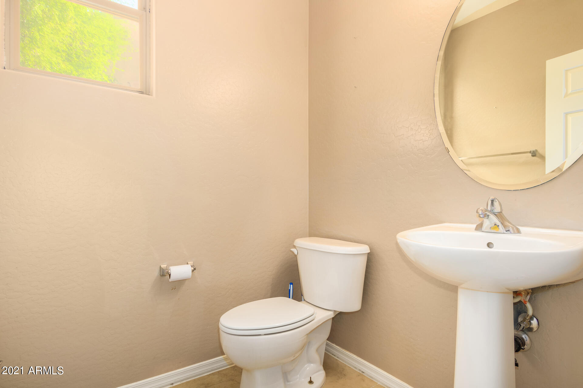 2217 West Harwell Rd. Phoenix, AZ 85041 - Photo 30 of 41 Half bath at front room