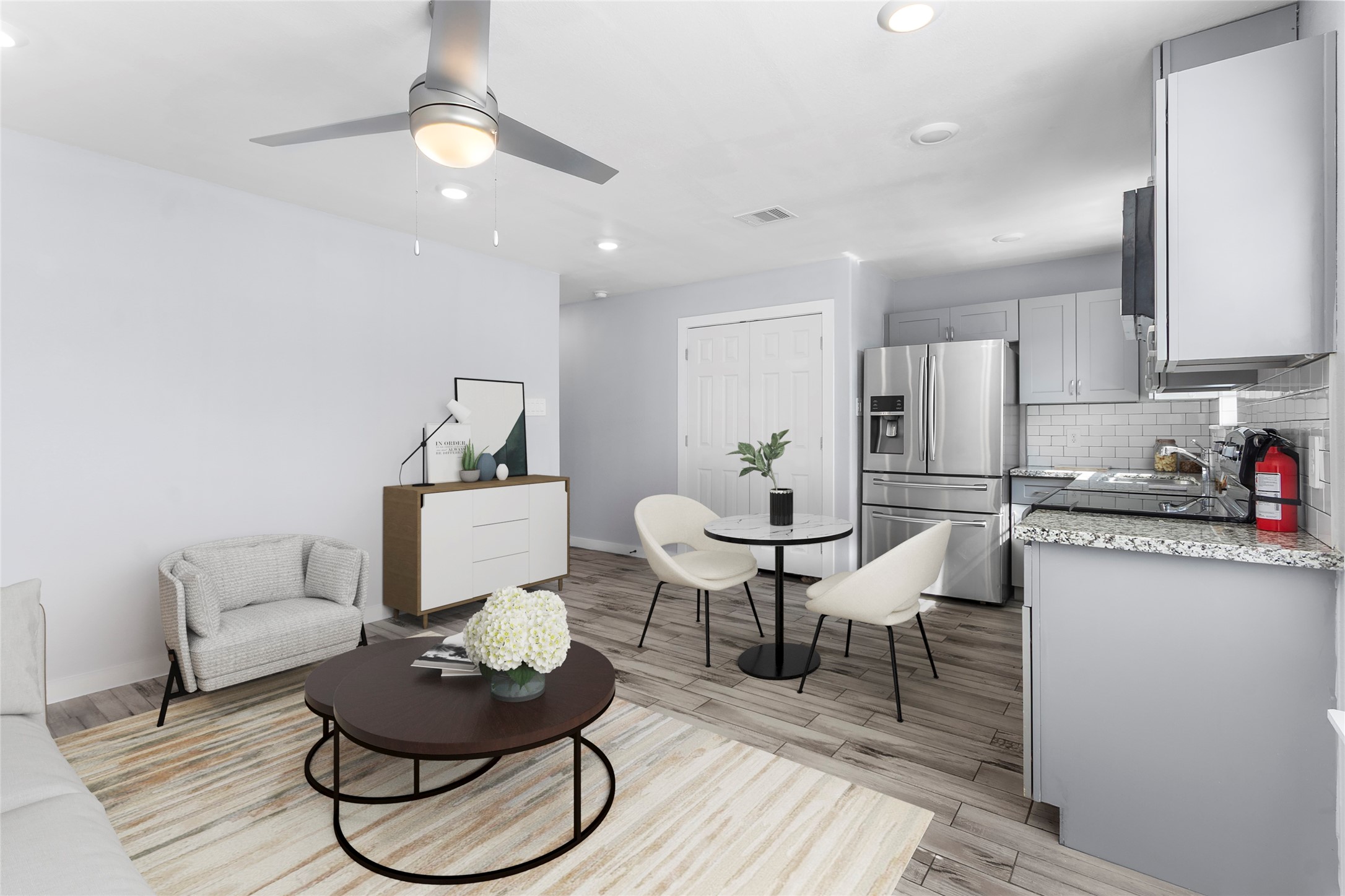 6809 Glass Street, Unit A Houston, TX 77016 - Photo 2 of 20 Virtually staged living room, dining and kitchen