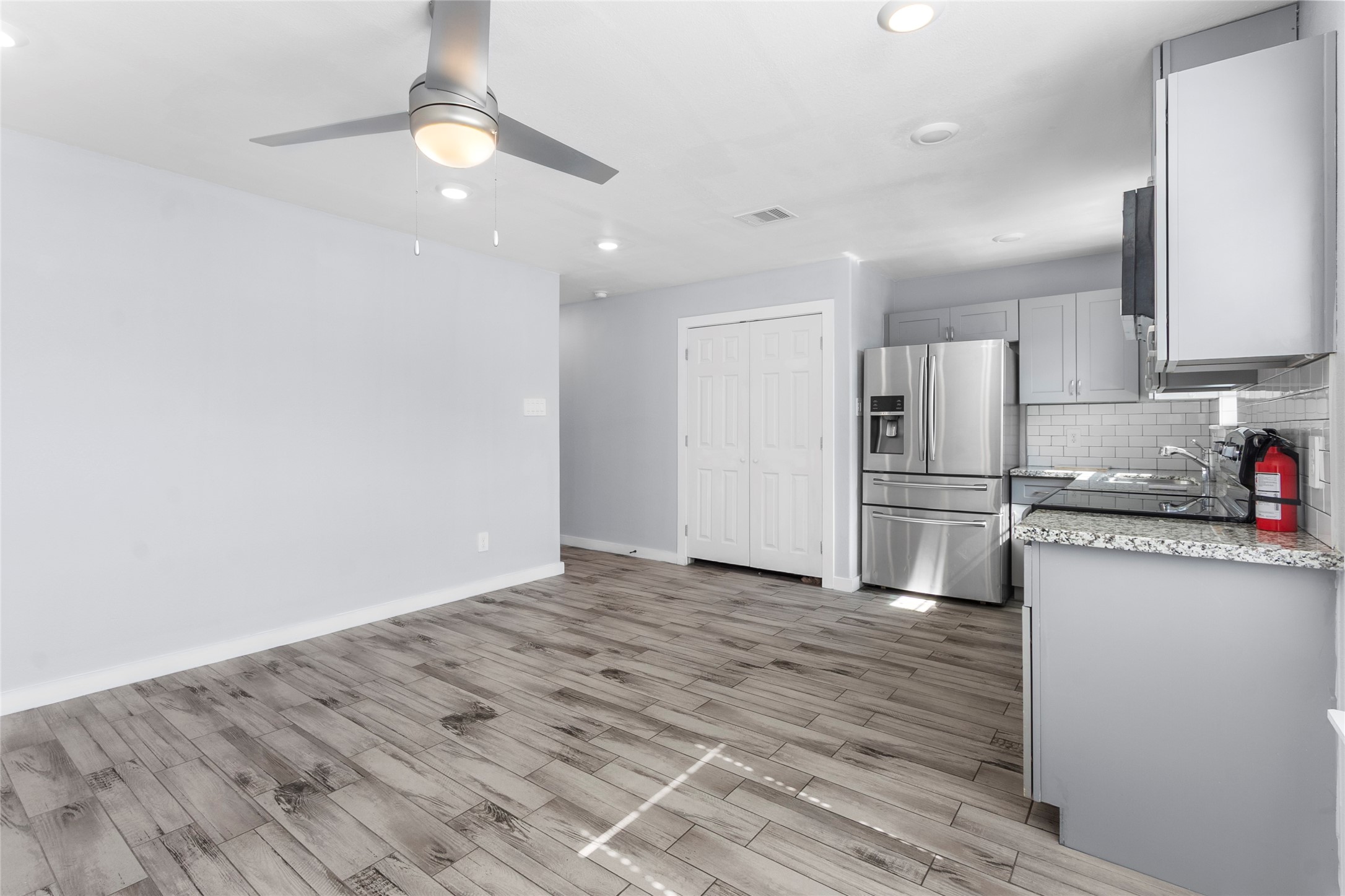 6809 Glass Street, Unit A Houston, TX 77016 - Photo 3 of 20 Open living room, kitchen and dining room