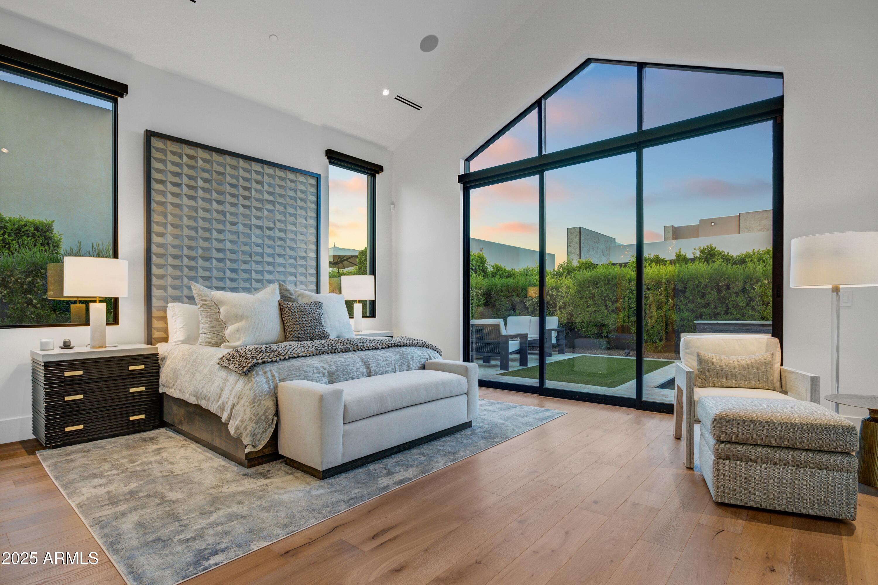 6930 East Cactus Wren Road Paradise Valley, AZ 85253 - Photo 13 of 26 a living room with furniture and a large window
