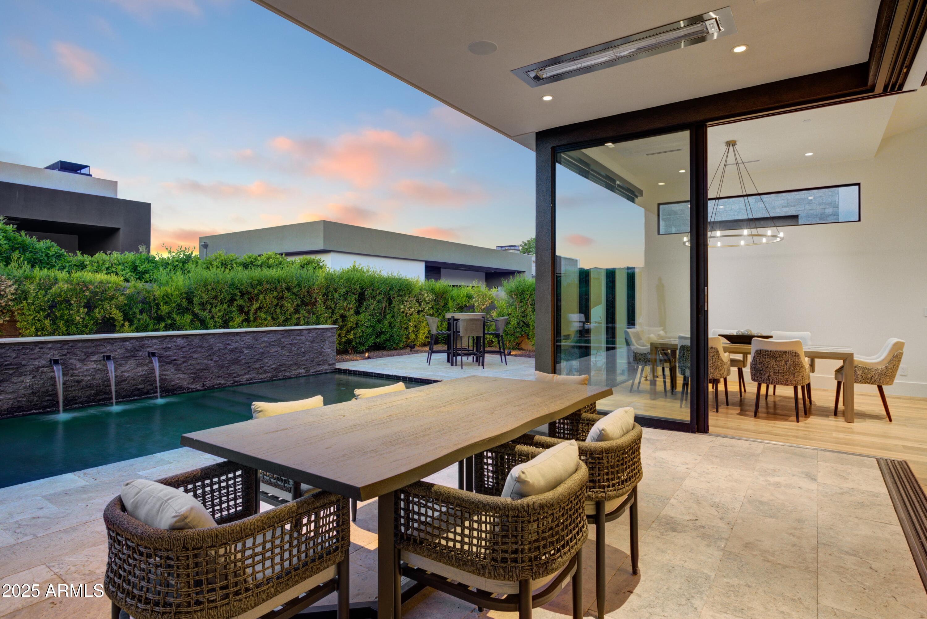 6930 East Cactus Wren Road Paradise Valley, AZ 85253 - Photo 23 of 26 a outdoor space with patio furniture