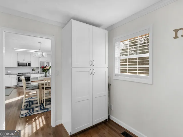 a view of a chairs and table on the deck