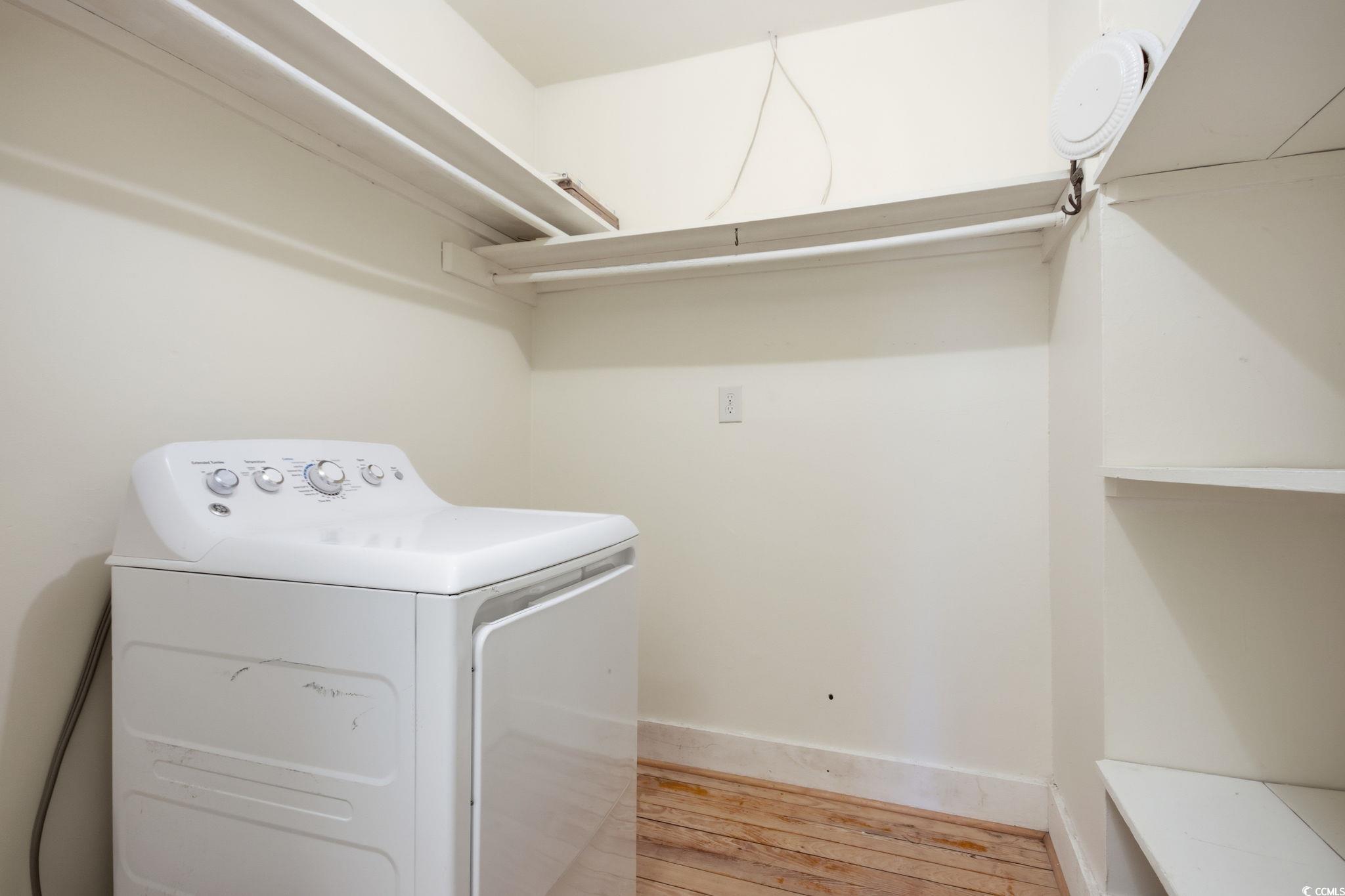 2206 Beck Street Georgetown, SC 29440 - Photo 13 of 36 Laundry area with washer / clothes dryer and hardwood / wood-style flooring