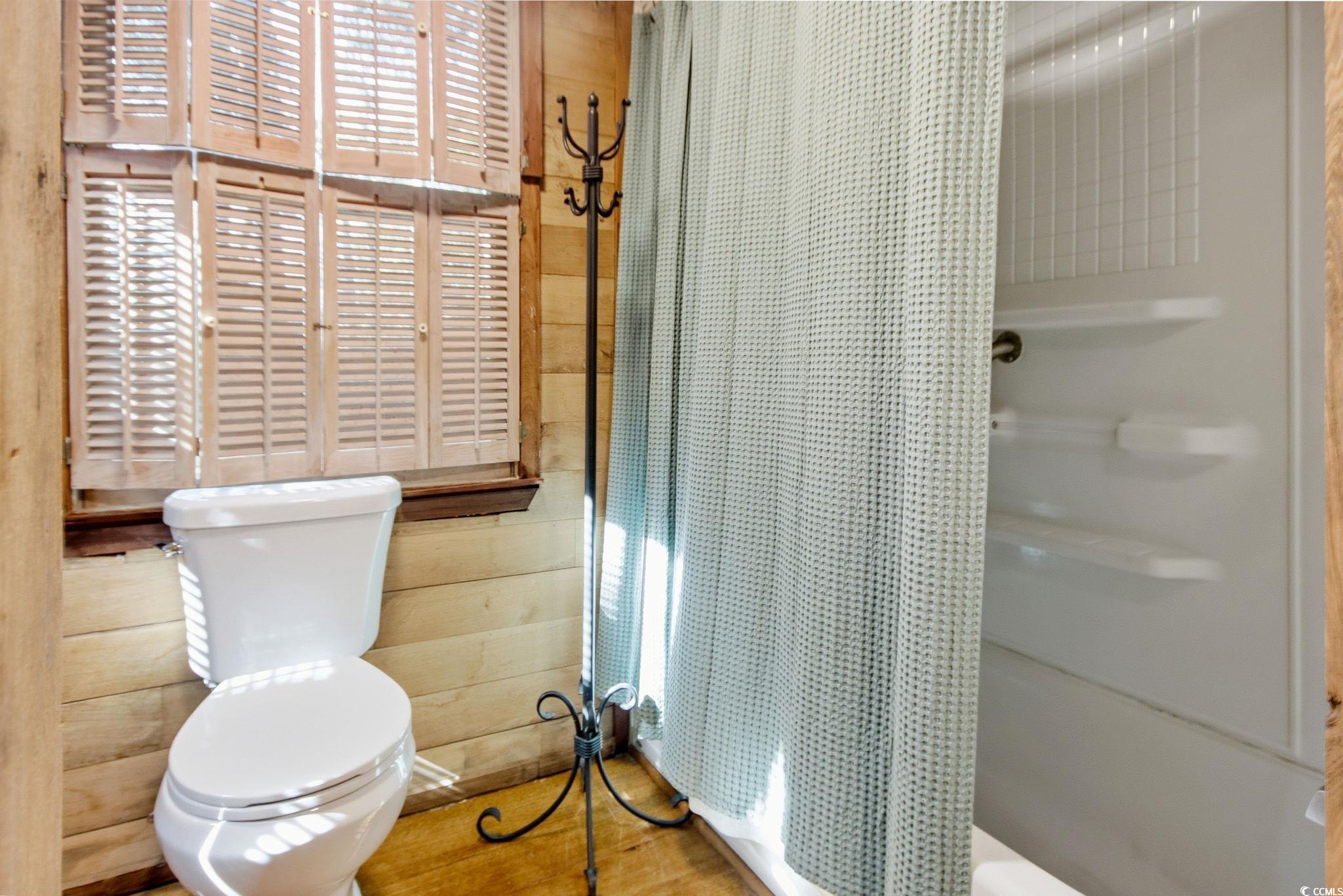 2206 Beck Street Georgetown, SC 29440 - Photo 21 of 36 Bathroom featuring toilet and curtained shower