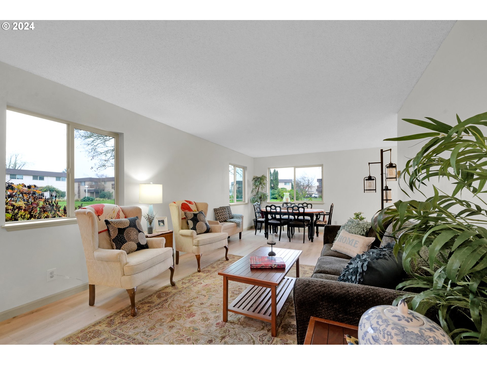 2727 Gateway Street, Unit 36 Springfield, OR 97477 - Photo 2 of 46 a living room with furniture and a large window