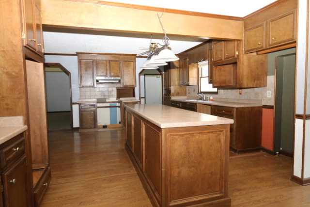 207 J R Boulevard Macon, GA 31220 - Photo 7 of 18 a kitchen with stainless steel appliances granite countertop a refrigerator a stove and a sink