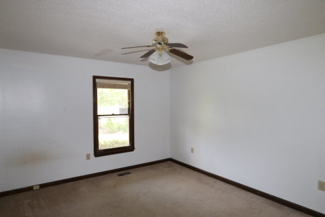207 J R Boulevard Macon, GA 31220 - Photo 9 of 18 a view of empty room with windows