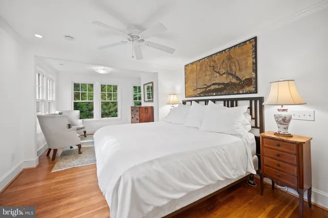 a bathroom with a tub shower and sink