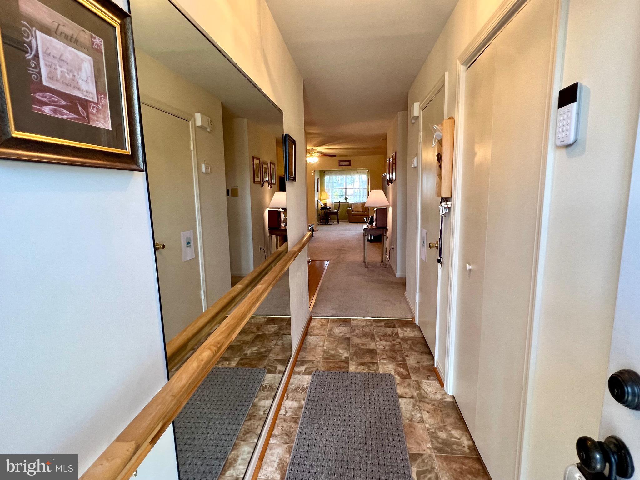 9278 Cherry Lane, Unit 95 Laurel, MD 20708 - Photo 15 of 28 Entry foyer with large mirrors and closet