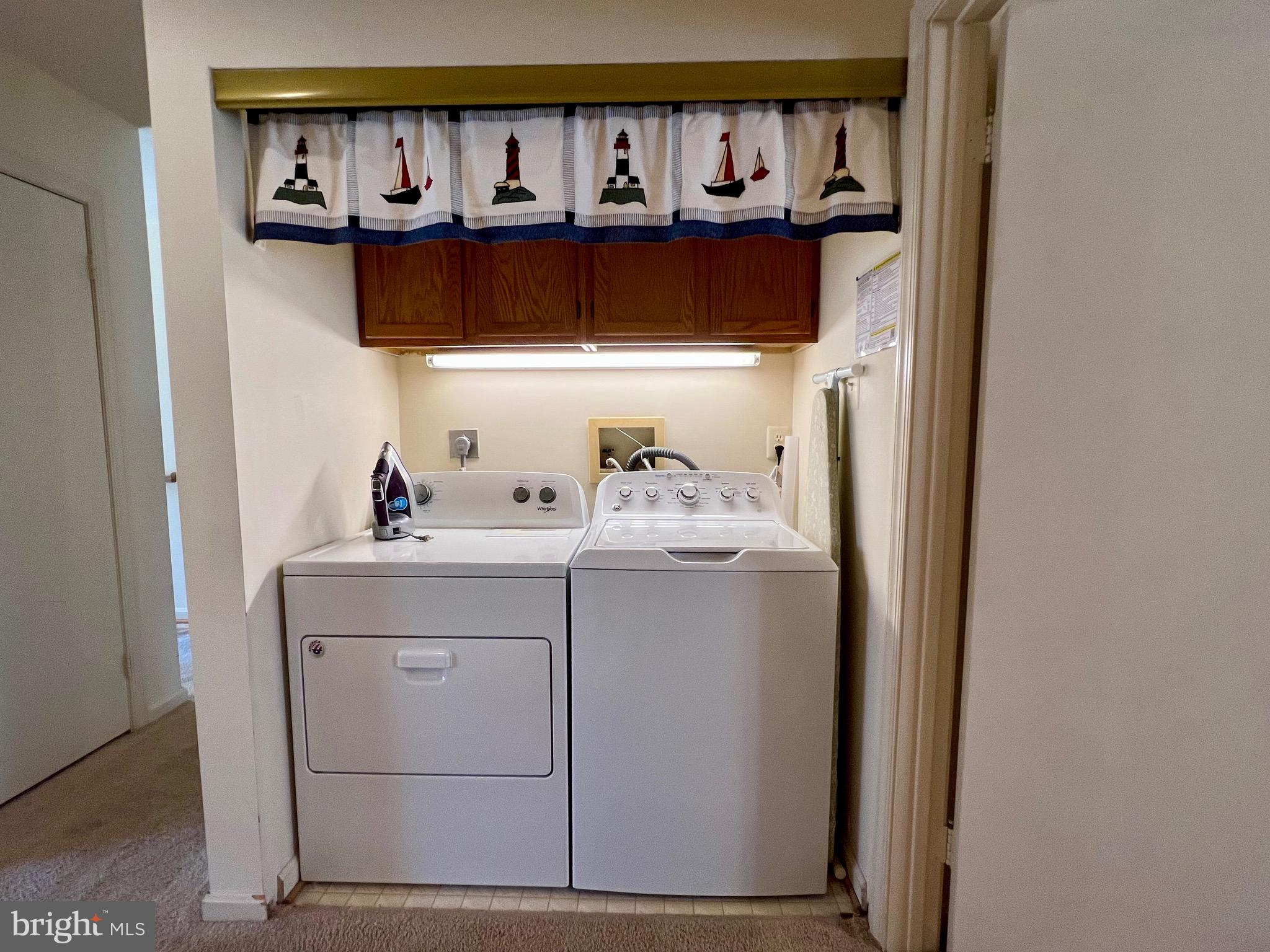 9278 Cherry Lane, Unit 95 Laurel, MD 20708 - Photo 23 of 28 Laundry area in hall