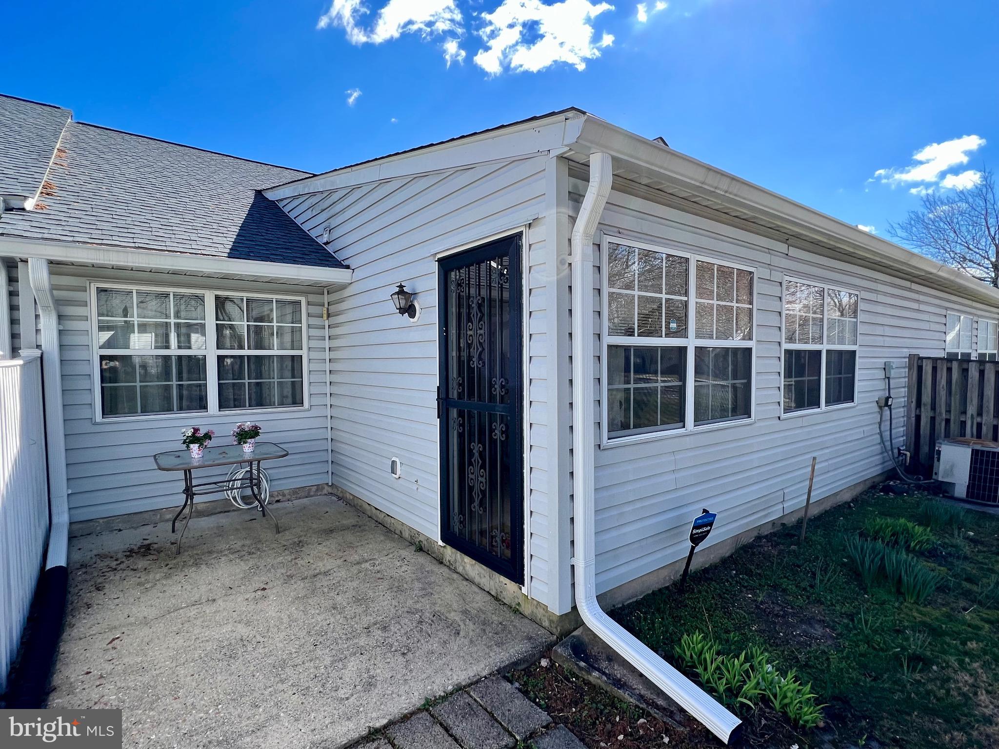9278 Cherry Lane, Unit 95 Laurel, MD 20708 - Photo 27 of 28 Patio off sunroom