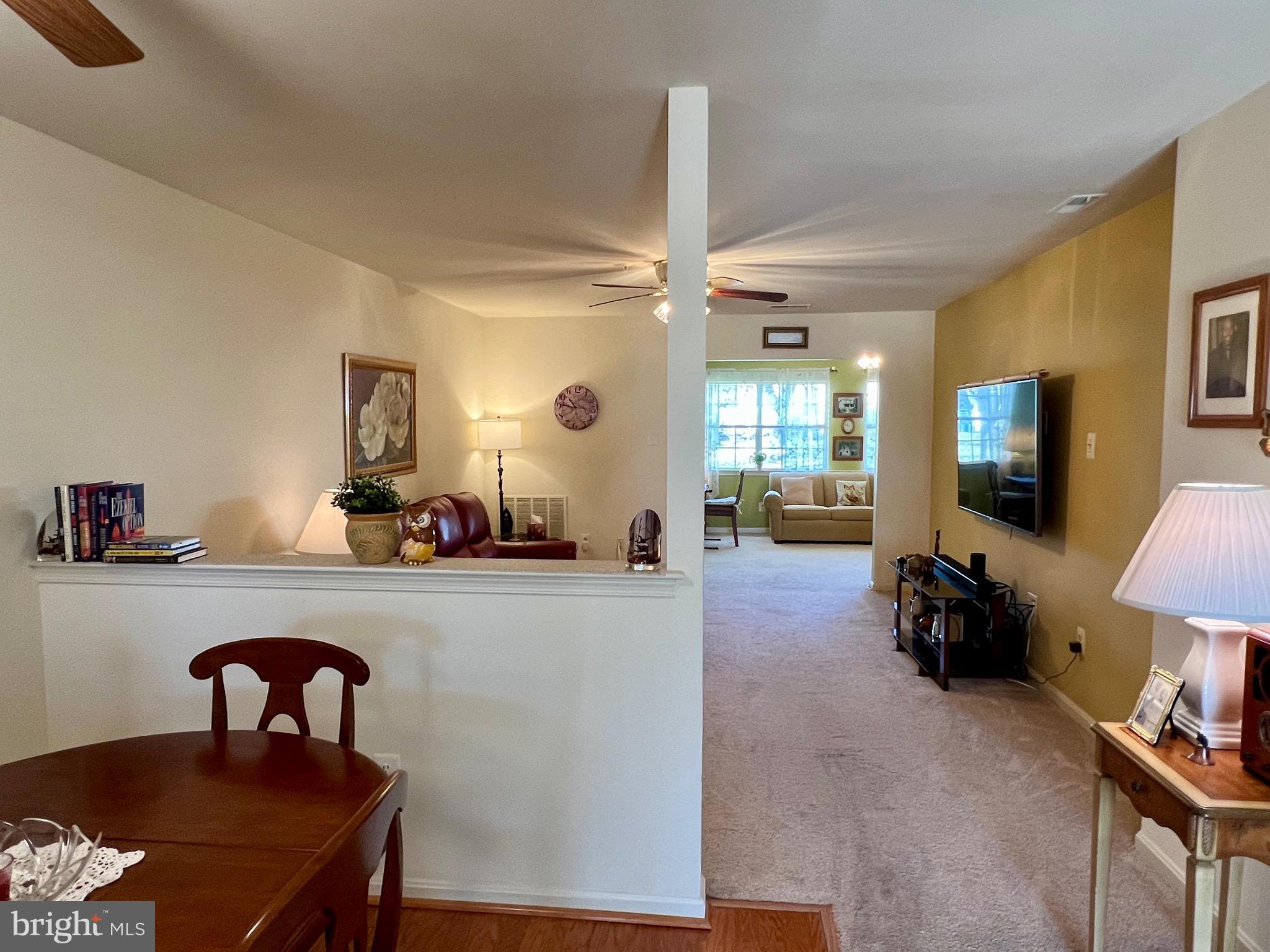 9278 Cherry Lane, Unit 95 Laurel, MD 20708 - Photo 6 of 28 Dining area overlooking living room