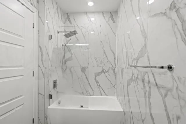 a bathroom with a bathtub