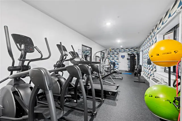a view of a room with gym equipment