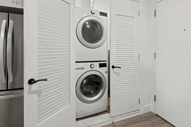 a utility room with dryer and washer