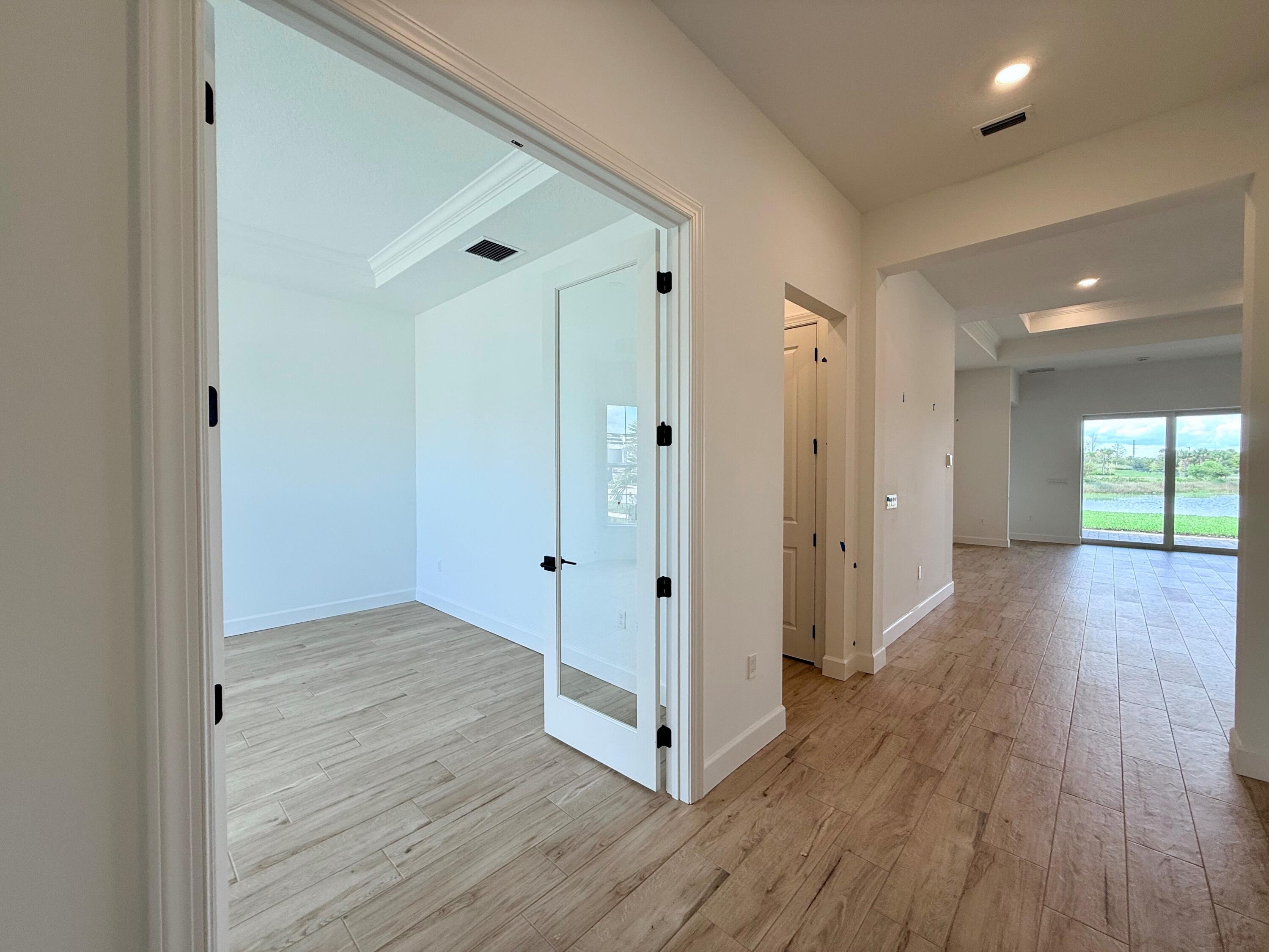 10350 Southwest Highpointe Drive, Unit 112 ASHBY Stuart, FL 34997 - Photo 14 of 28 112 Foyer