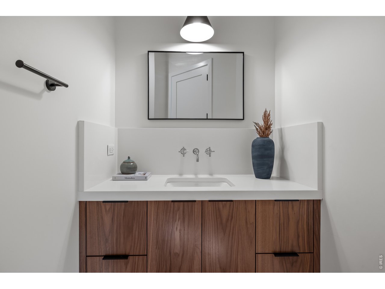 9578 Mountain Ridge Drive Boulder, CO 80302 - Photo 31 of 47 a bathroom with a sink vanity and a mirror