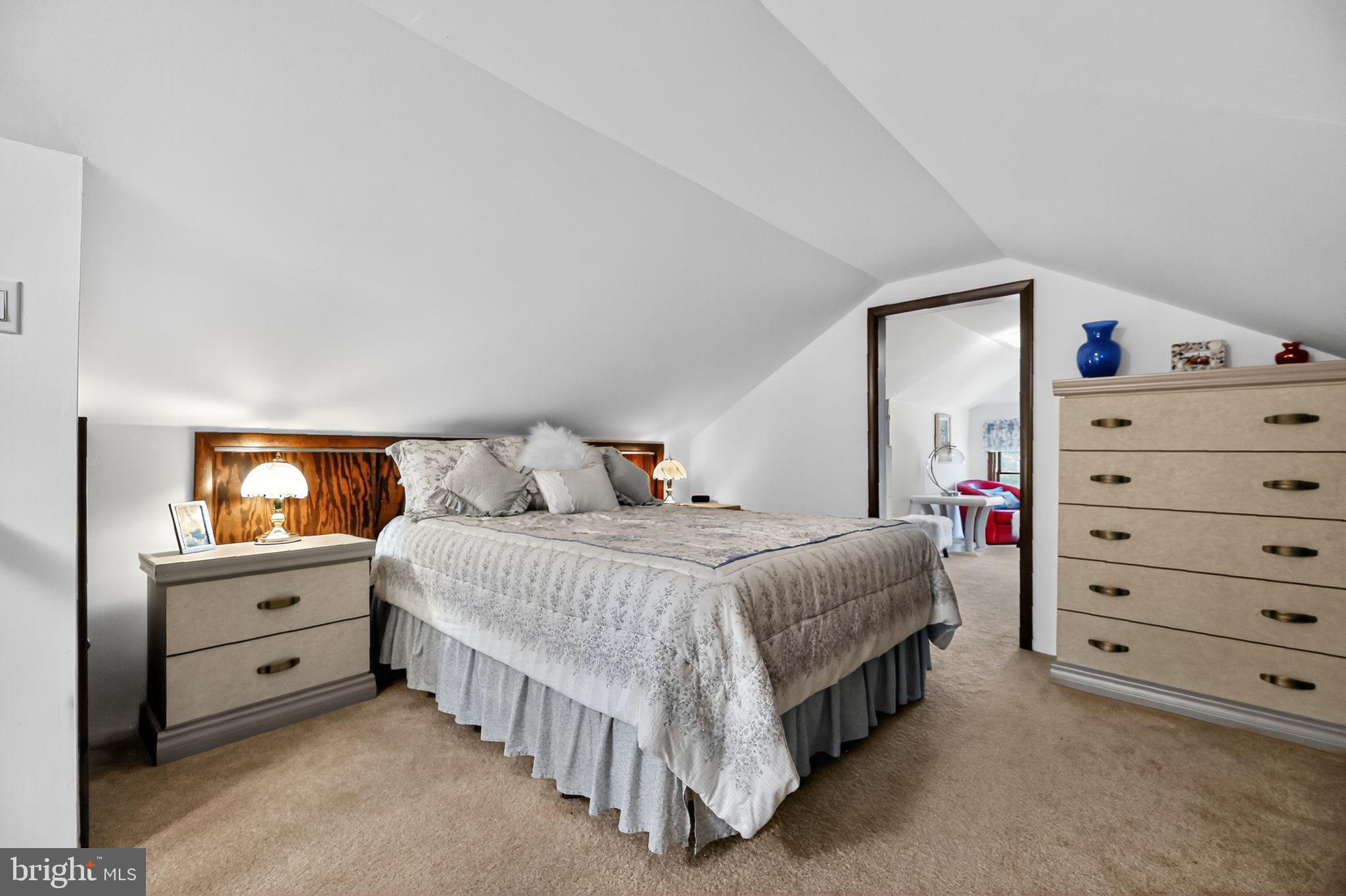 37 Pine Grove Avenue Clementon, NJ 08021 - Photo 16 of 28 a spacious bedroom with a bed and a dresser