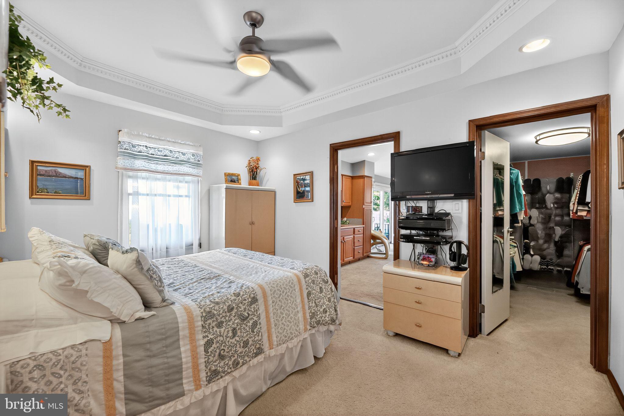 37 Pine Grove Avenue Clementon, NJ 08021 - Photo 17 of 28 a bedroom with a bed couch tv and a window