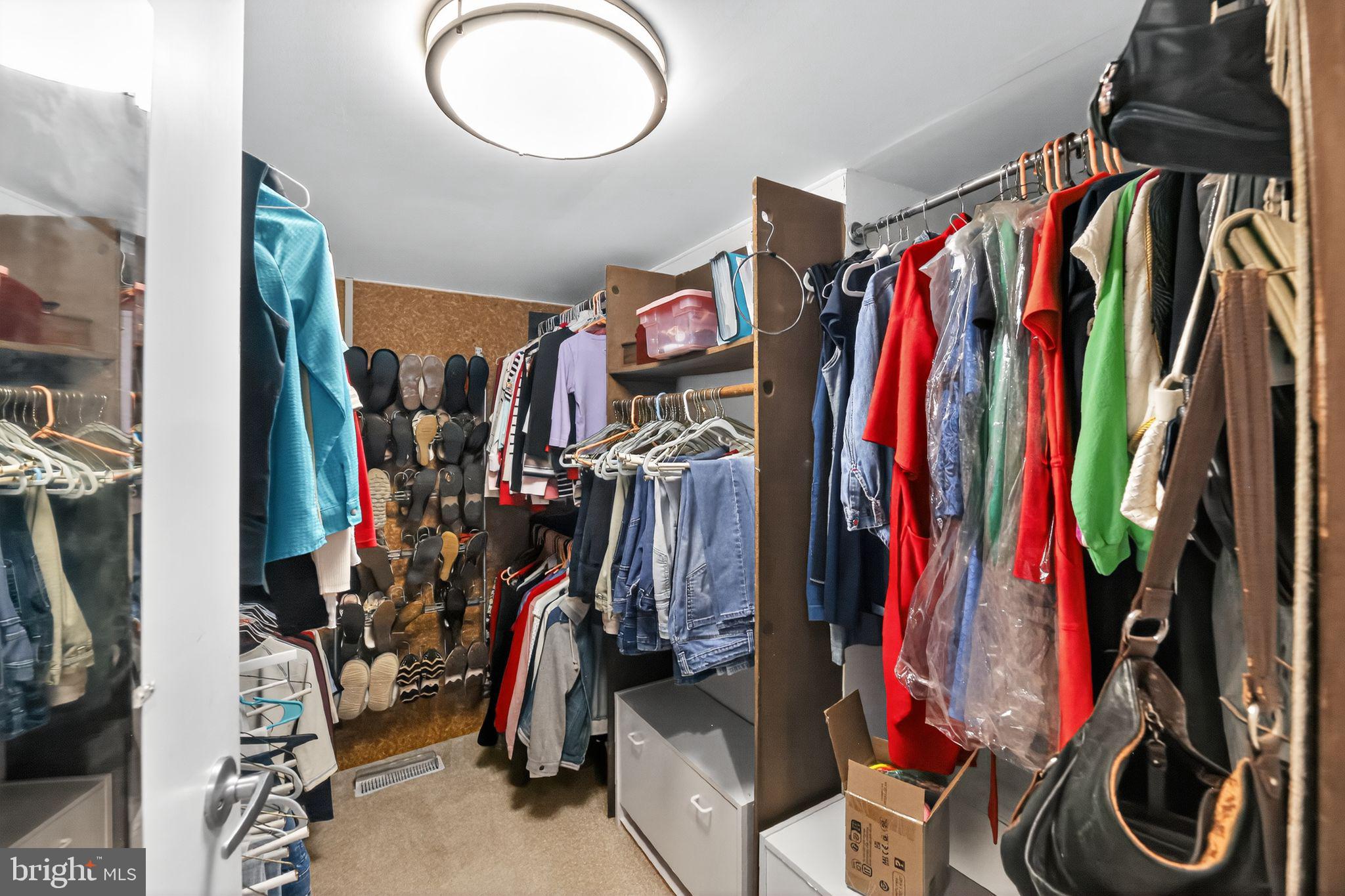 37 Pine Grove Avenue Clementon, NJ 08021 - Photo 18 of 28 a view of walk in closet with clothes