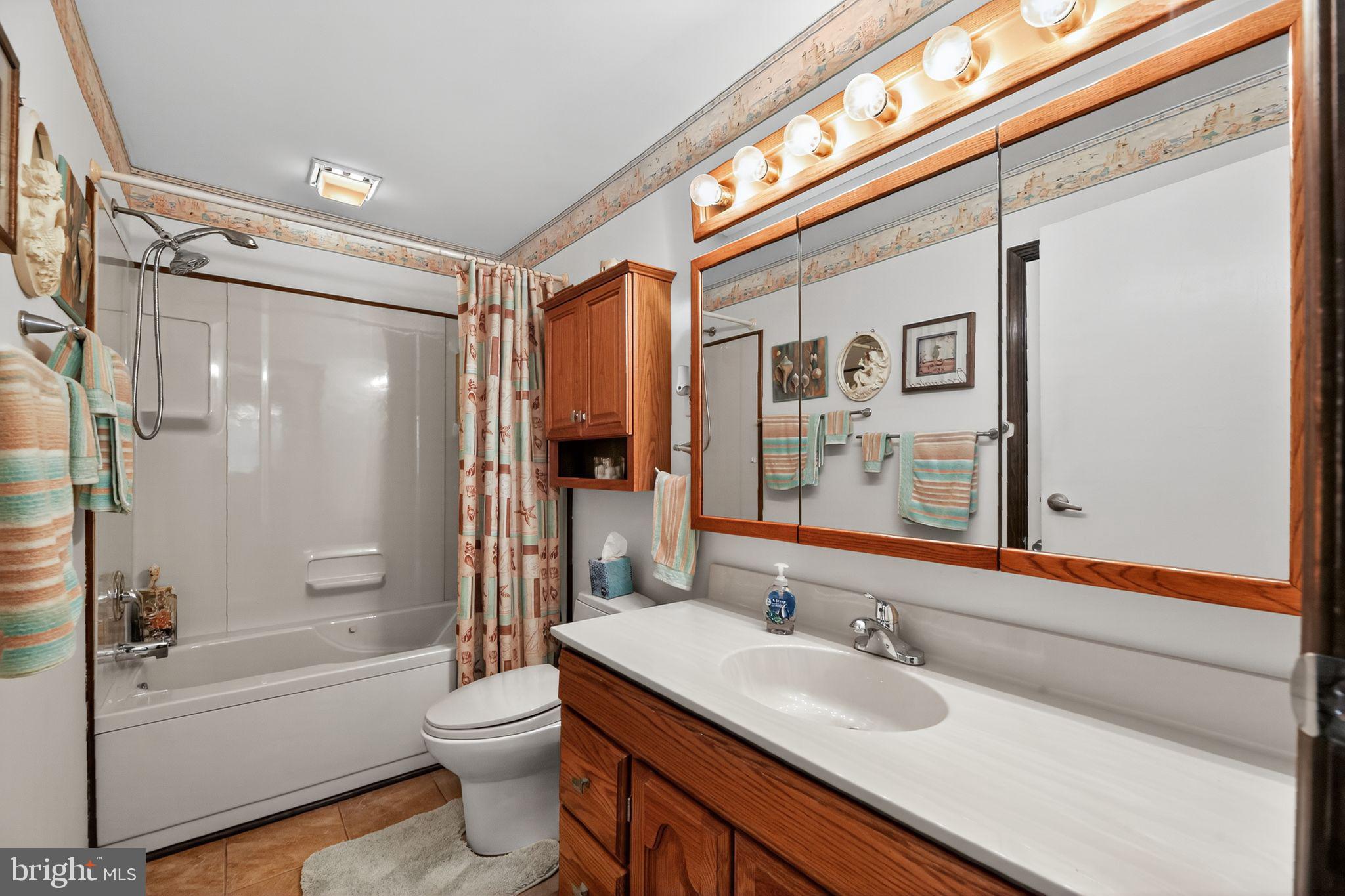 37 Pine Grove Avenue Clementon, NJ 08021 - Photo 20 of 28 a bathroom with a granite countertop sink toilet and shower