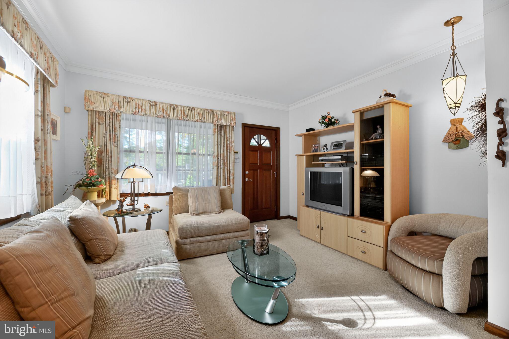 37 Pine Grove Avenue Clementon, NJ 08021 - Photo 8 of 28 a living room with furniture fireplace and flat screen tv