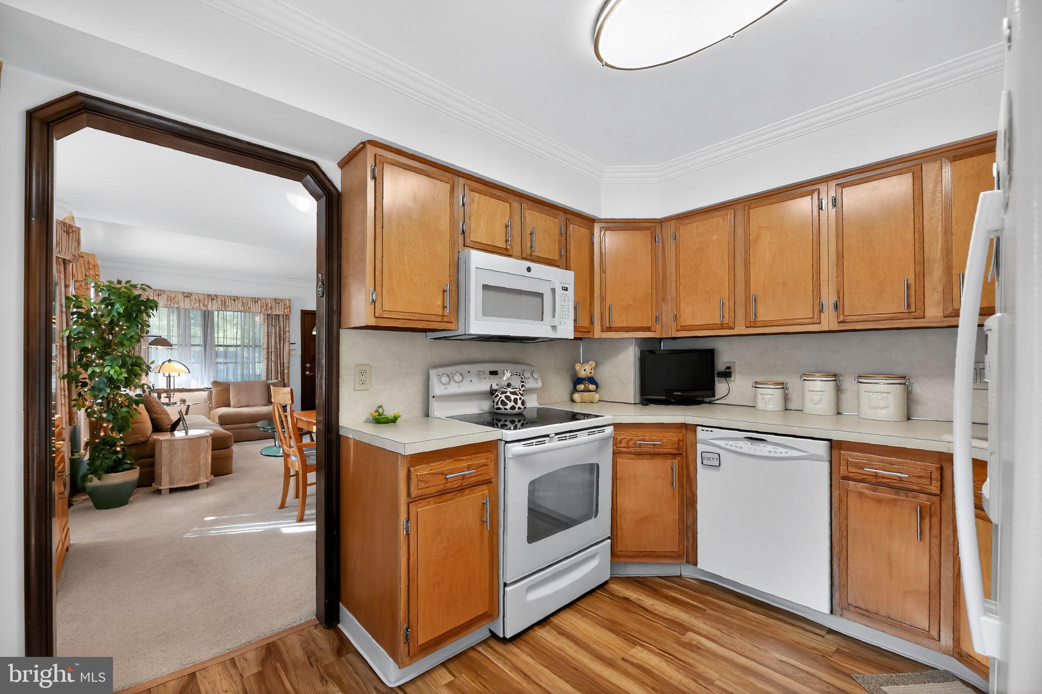 37 Pine Grove Avenue Clementon, NJ 08021 - Photo 10 of 28 a kitchen with a stove top oven sink and cabinets
