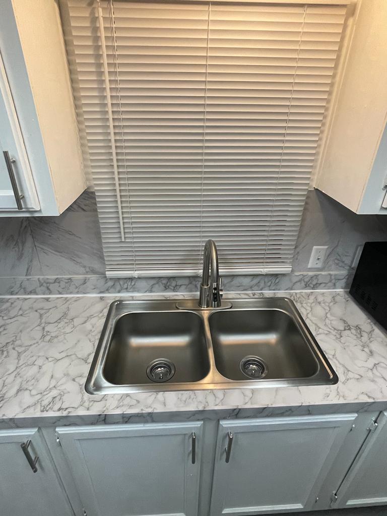 99 Partridge Lane Beecher, IL 60401 - Photo 6 of 22 a close view of sink and tap