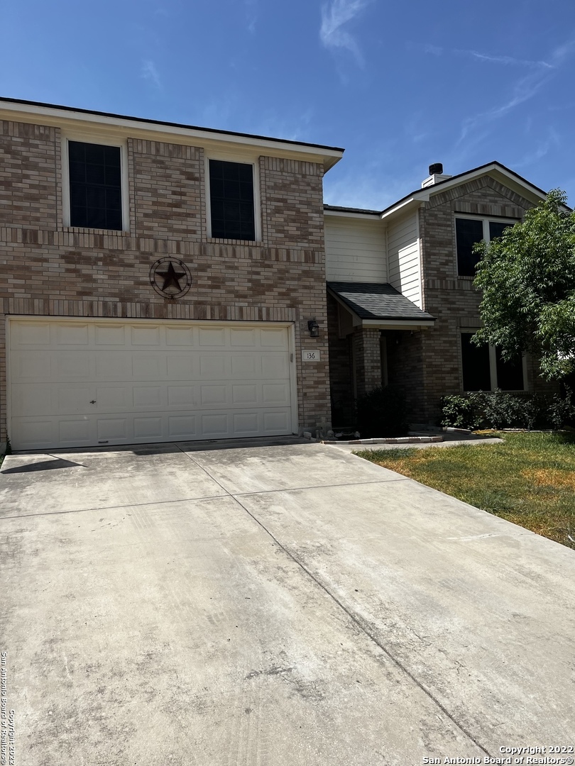 136 Dew Fall Trail Cibolo, TX 78108 - Photo 1 of 1 a front view of a house with a yard