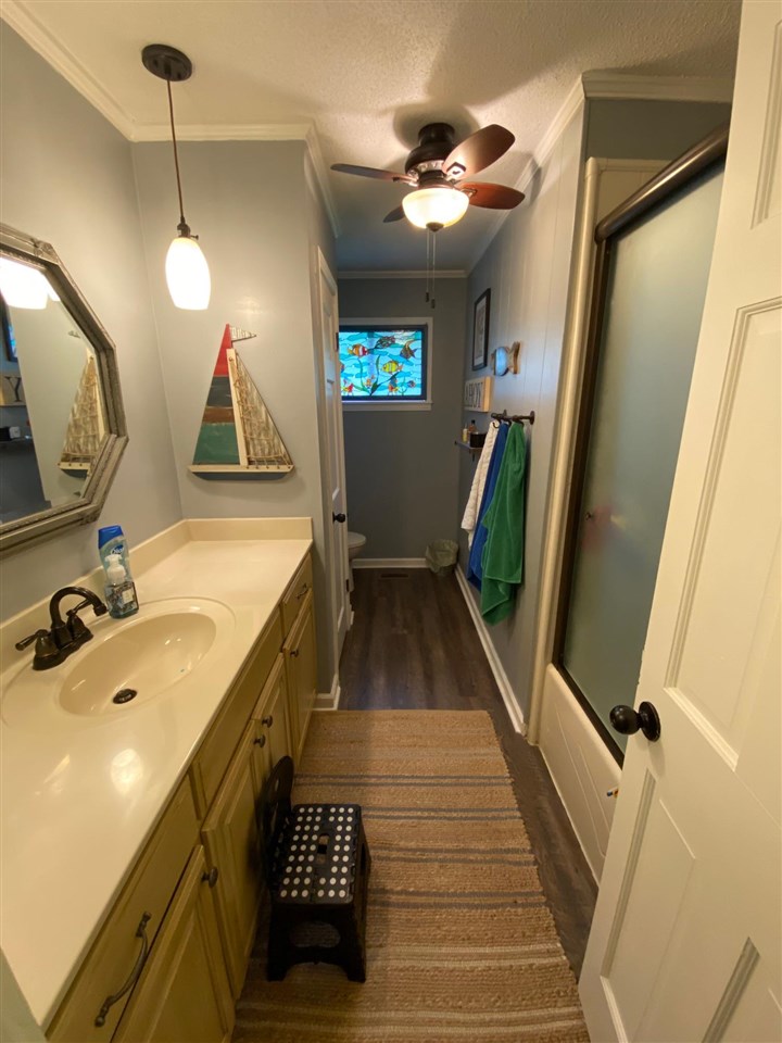2110 Melrose Road Brighton, TN 38011 - Photo 14 of 25 The renovated and very spacious hall bathroom features a large vanity and linen closet.