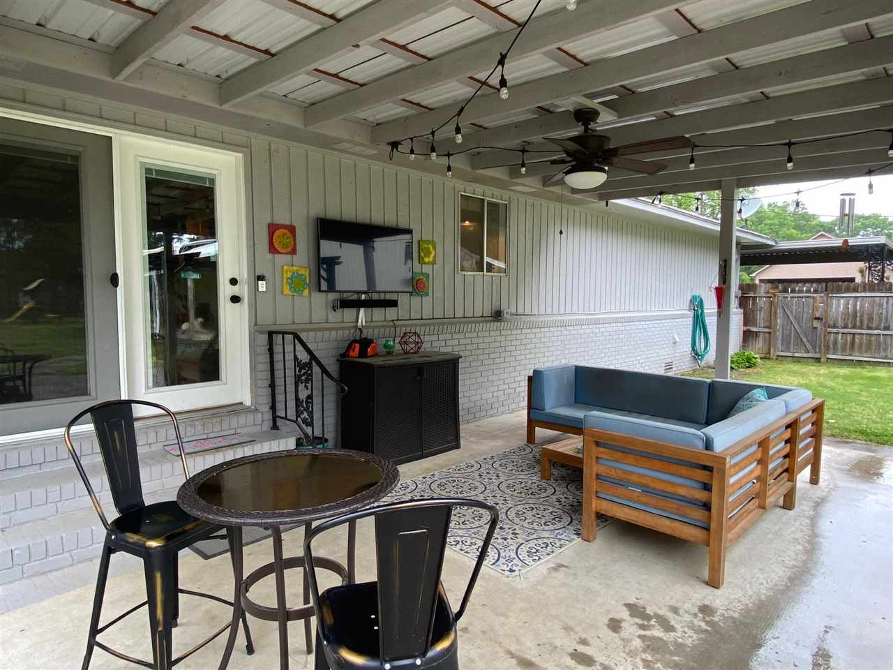 2110 Melrose Road Brighton, TN 38011 - Photo 20 of 25 The covered patio is attached to the house off of the dining room french doors.