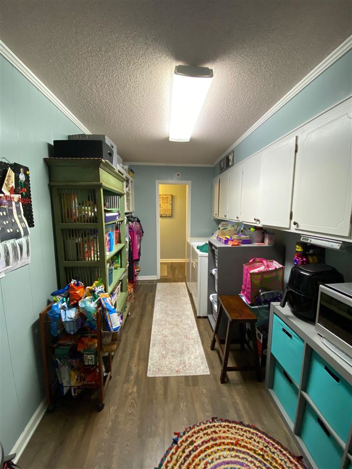 2110 Melrose Road Brighton, TN 38011 - Photo 6 of 25 A 1/2 bath is located at the end of the room.