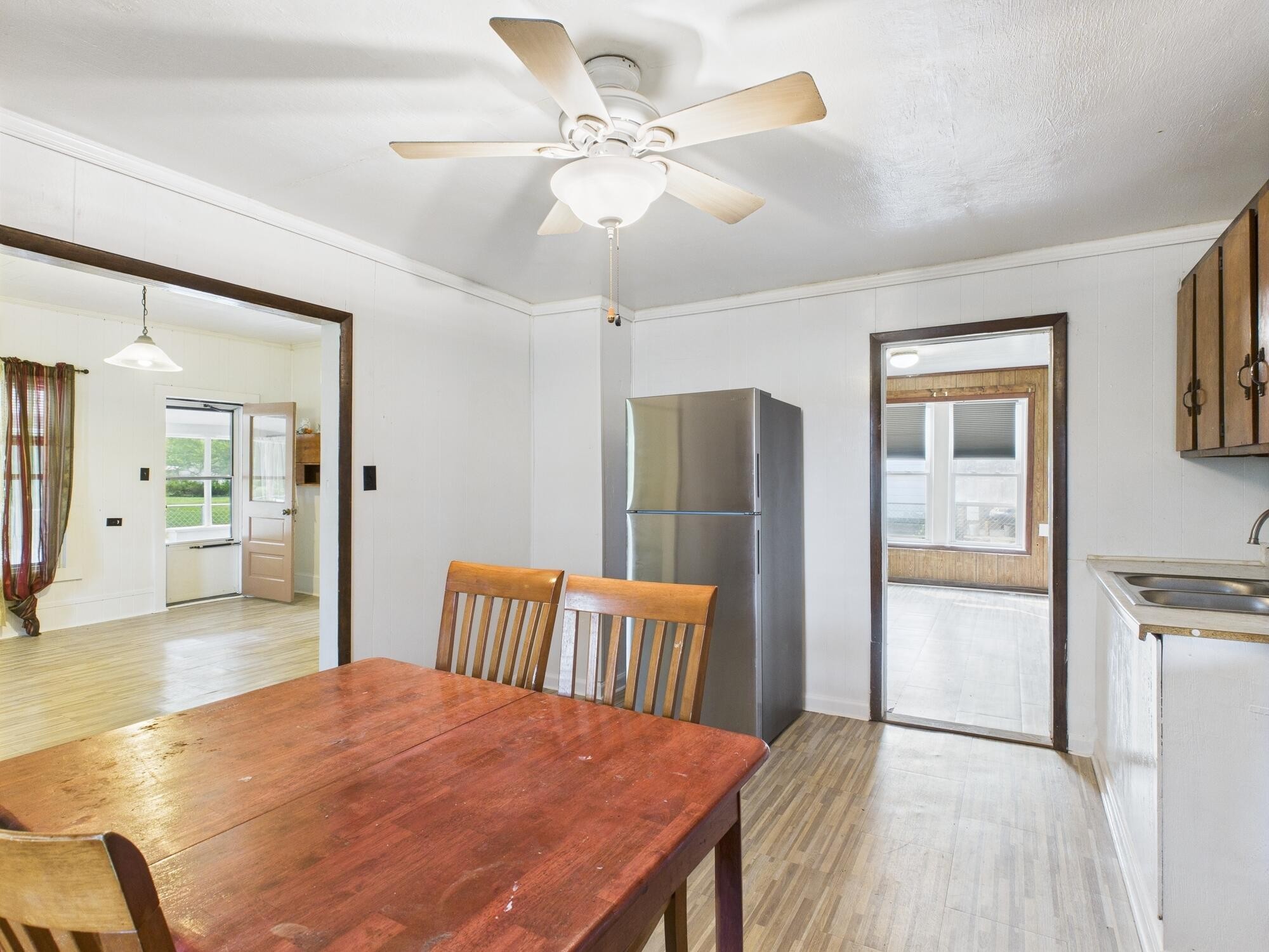 174 East Jackson Avenue Spring City, TN 37381 - Photo 12 of 28 a bedroom with a bed and a refrigerator