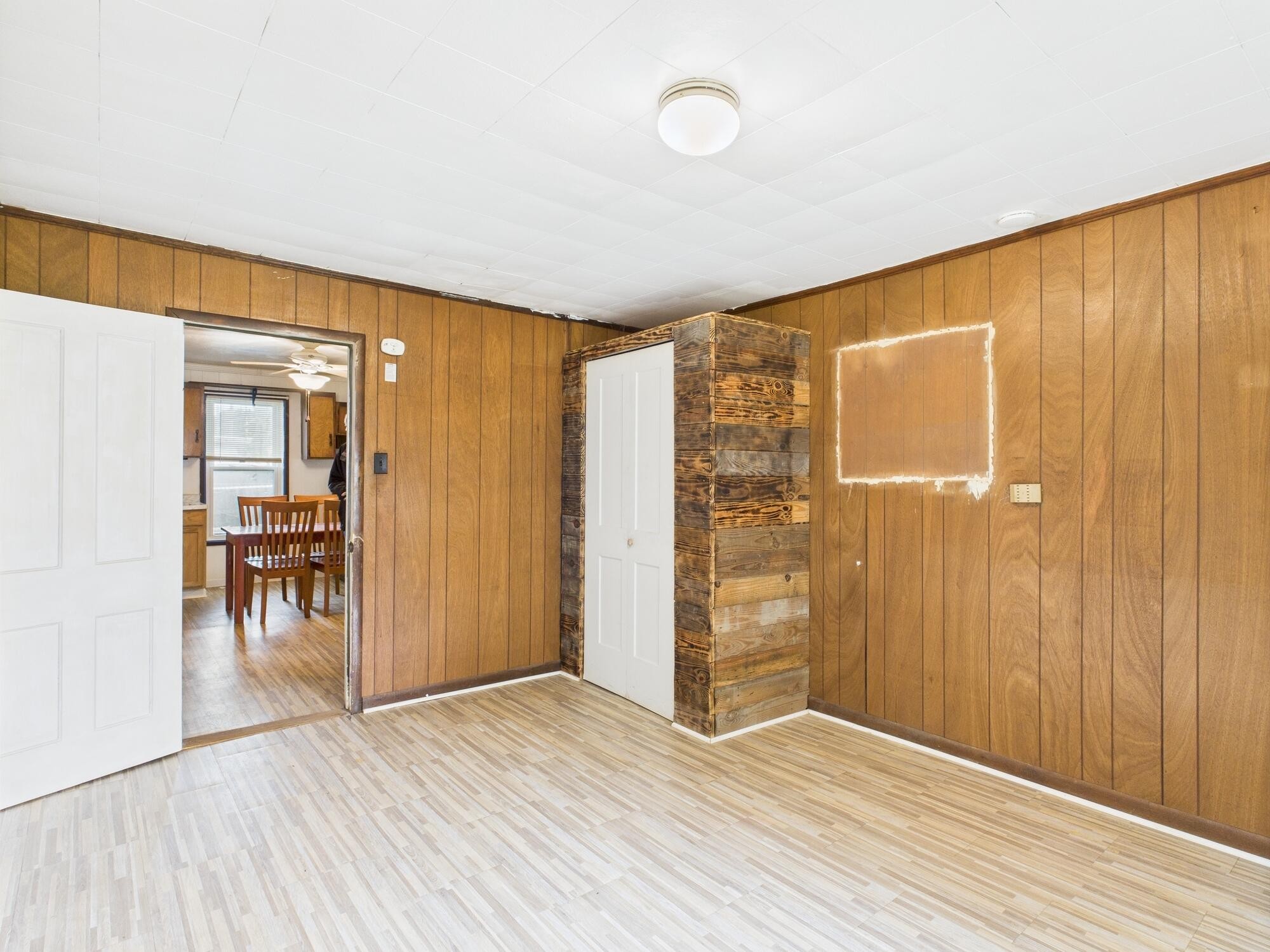 174 East Jackson Avenue Spring City, TN 37381 - Photo 16 of 28 wooden floor in an empty room with a window