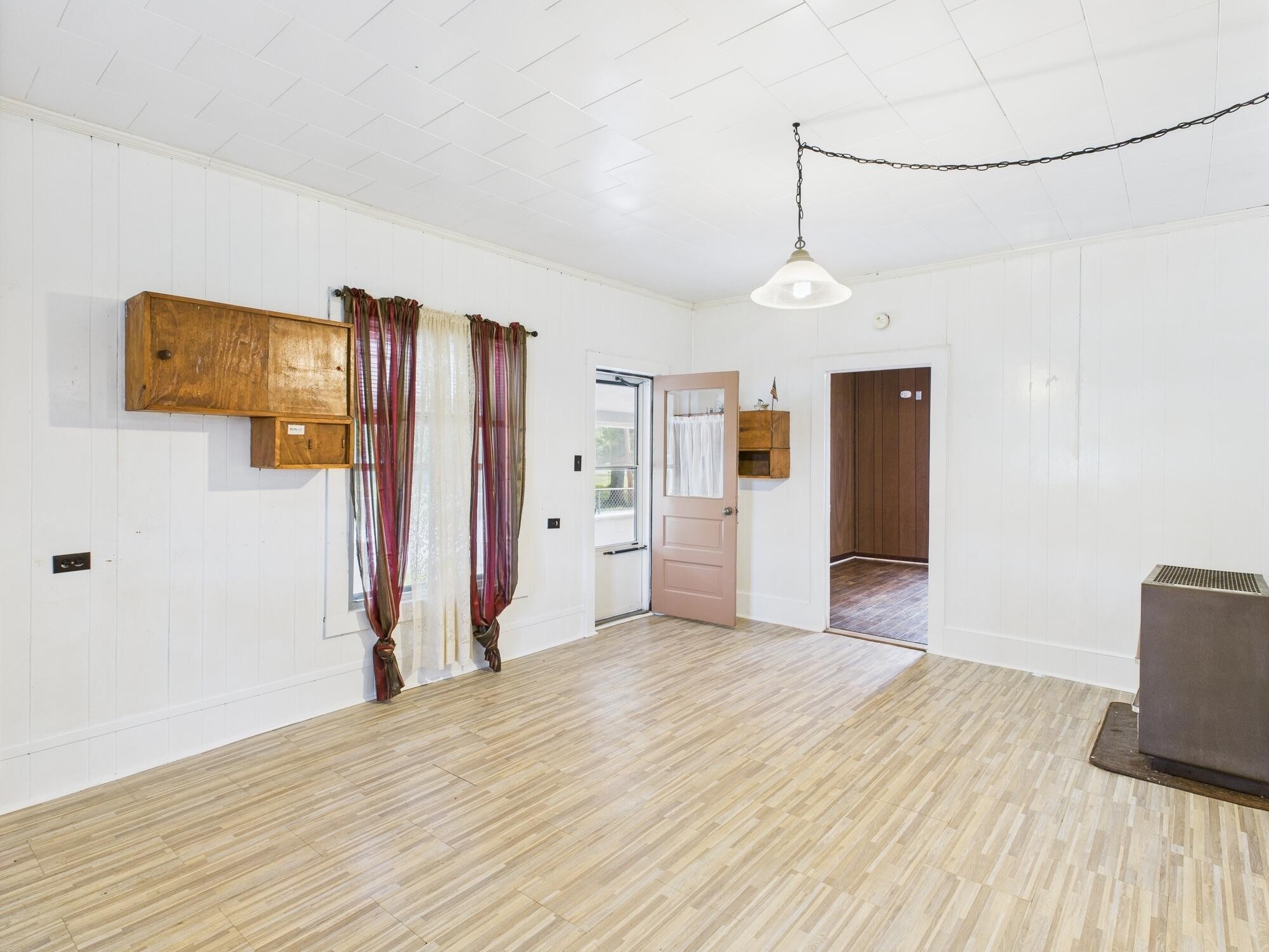 174 East Jackson Avenue Spring City, TN 37381 - Photo 6 of 28 a view of a kitchen with a refrigerator and a dresser