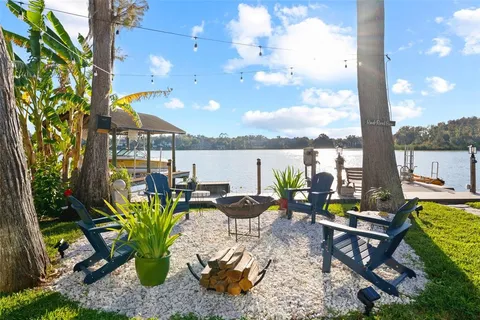 a view of a terrace with furniture and sitting area