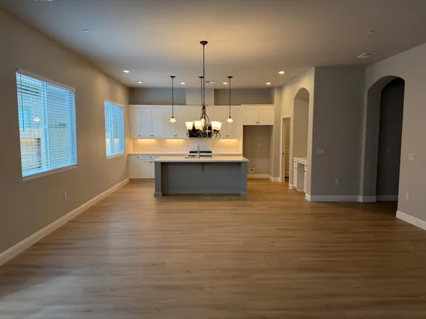 a room with a dresser and a mirror