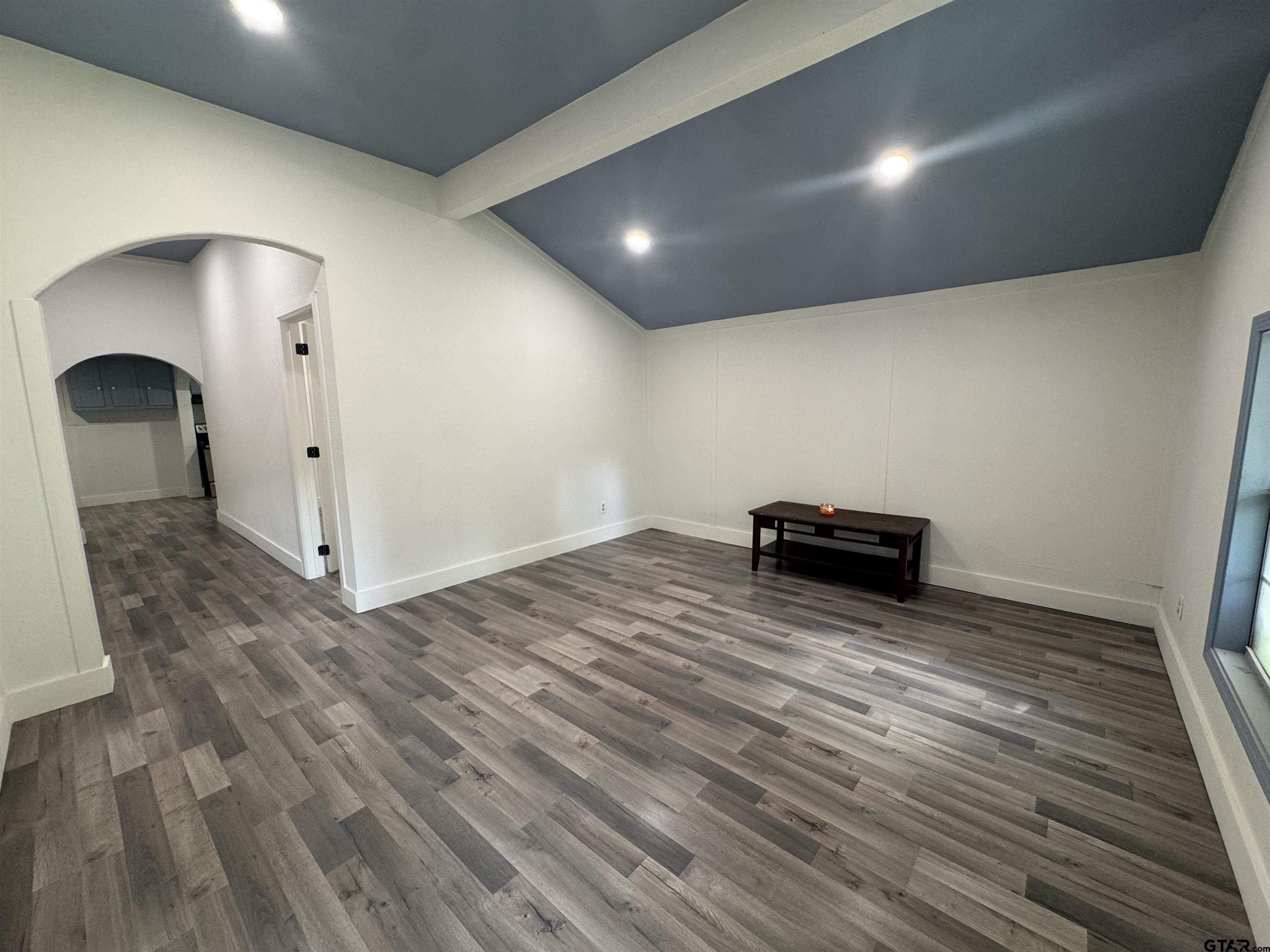 8124 County Road 381 Tyler, TX 75708 - Photo 12 of 23 a view of empty room with wooden floor